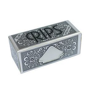 A box of Rips Silver Rolling Paper Rolls on a white background. The box is white and black in colour, with an intricate design. The words 'Slim' and 'Extra Thin' are displayed next to the black Rips logo.