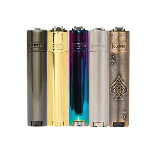 A collection of metal lighters in various colors and designs, including gold, silver, and bronze, each featuring the word 'CLIPPER' on the side.