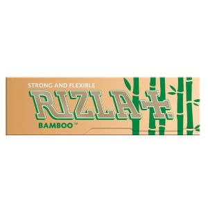 A pack of Rizla Bamboo King Size Slim Rolling Papers on a white background. The packet is beige in colour and features an illustration of green bamboo stalks, along with the words 'Strong and Flexible'