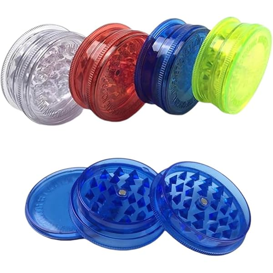 Unbranded Acrylic Herb Grinders in Assorted Colours – A group photo showing several two-piece plastic herb grinders in a variety of transparent colors against a white background.