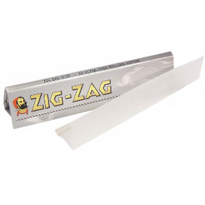 A pack of Zig-Zag brand rolling papers for tobacco or marijuana, showing the logo and a single rolling paper outside the pack.